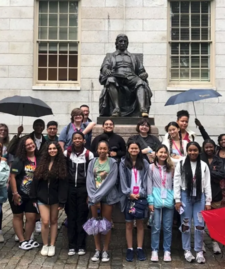 Group Shot With Harvard And Umbrellas Ws