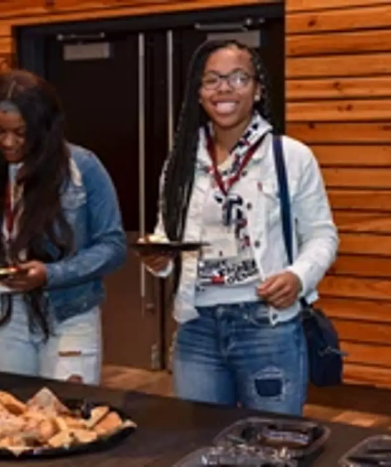 Twomemberseatingatevent_2019