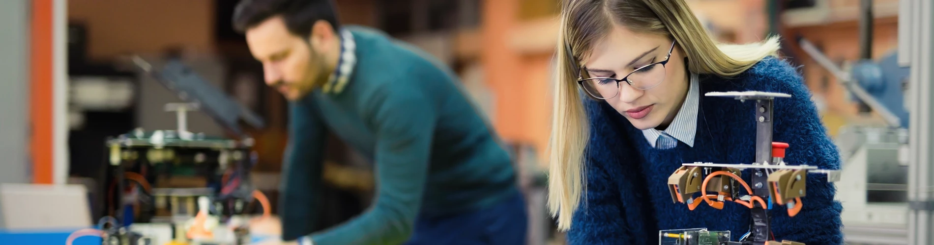 A Blonde student working on a project