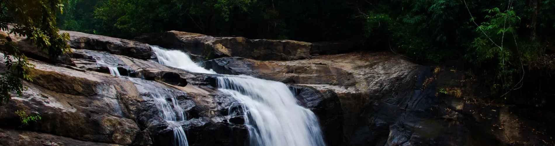 A waterfall flowing over rocks